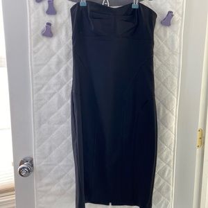 Tight black strapless dress